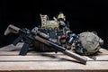 Bulletproof vest,rifle and helmet on black background