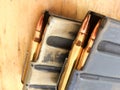 Bullets .223 brass 5.56 caliber ammo loaded magazine for AR 15 rifle Royalty Free Stock Photo