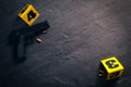 Bullets, gun and crime scene markers on black slate background, flat lay. Space for text Royalty Free Stock Photo