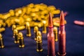 Bullets and handcuffs. Close-up of 9mm pistol. Gun and weapon with bullets amunition on black backround. Top view.