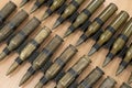 Bullets in a iron metal belt lined as a weapon, military concept Royalty Free Stock Photo