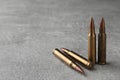 Bullets on light grey table, closeup. Space for text Royalty Free Stock Photo