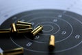 Bullets on paper target for shooting practice Royalty Free Stock Photo