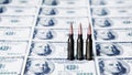 Bullets on US Dollar bills as symbol of bloody business, military conflicts and murders