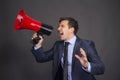 Bullhorn businessman megaphone profile shouting Royalty Free Stock Photo