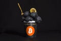 Bullish trend of Bitcoin cryptocurrency. Bitcoin gold coin and ice cream and champagne. Virtual cryptocurrency concept. Black