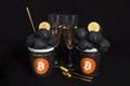 Bullish trend of Bitcoin cryptocurrency. Bitcoin gold coin and ice cream and champagne. Virtual cryptocurrency concept. Black