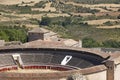 Bullring in Brihuega and Alcarria summer landscape. Guadalajara, Spain