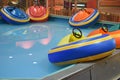 Bumper Boats In Reflective Aqua Water