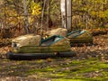 Bumper cars in abandoned amusement park in Pripyat, Chernobyl Exclusion Zone in autumn. Ukraine. Royalty Free Stock Photo