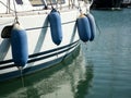 Bumpers on the boats moored in port Royalty Free Stock Photo