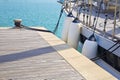 Bumpers protection between two moored boats in a small harbour Royalty Free Stock Photo