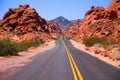 The bumps of the infinite road in the red rocks canyon of the Valley of Fire Royalty Free Stock Photo