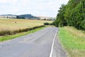 bumpy bad road in rural landscape