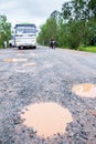 A bumpy dirt road as highway of South Cambodia from Sihanoukville to Koh Kong, the bus broken down backgrounds