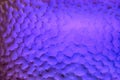 Bumpy glass surface with light reflections translucent purple, background, texture Royalty Free Stock Photo