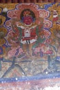 Guardian Lord deity fresco outside temple