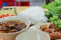 Bun cha, Vietnamese vermicelli with grilled pork served with fresh herbal Royalty Free Stock Photo