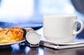 Bun and cup of coffee Royalty Free Stock Photo