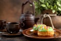 Bun, donut covered with glaze. Tutti frutti bun on a plate. Sweet pastries. Dessert. Still life. Close-up. Royalty Free Stock Photo