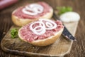 Bun with Mett (German cuisine; selective focus) Royalty Free Stock Photo