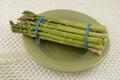 Bunch of asparagus on plate