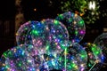 A bunch of balloons with LED lights