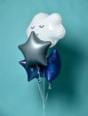 Bunch of balloons white cloud shape metallic balloon and stars for kids birthday party on blue mint