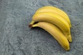Bunch of bananas on a biton background. Top view Royalty Free Stock Photo