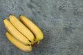 Bunch of bananas on a biton background. Top view Royalty Free Stock Photo