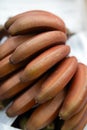 Bunch of bananas on boxes in supermarket Royalty Free Stock Photo