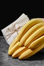 Bunch bananas isolated on grey white background A bunch of bananas on a gray background.