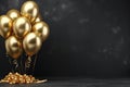 Bunch of big golden balloons objects for birthday party isolated on a black background Royalty Free Stock Photo