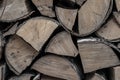 Bunch of birch logs firewood a source of heat a fire of fire a stack of wooden chipped background a base Royalty Free Stock Photo