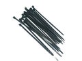 Bunch of Black Cable Ties Isolated on White Background Royalty Free Stock Photo