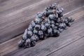 Bunch of black grapes on the table still life