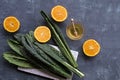 A bunch of black kale, Italian salad, Ingredients for smoothies with orange. Detox nutrition and vegetarianism. Free Royalty Free Stock Photo