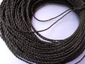 A bunch of black threaded rope