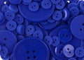 Blue colored sewing buttons isolated on white Royalty Free Stock Photo