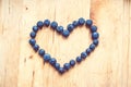 A bunch of blueberries shaped like a heart Royalty Free Stock Photo