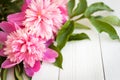 Bunch, bouquet of pink peonies on a wooden background. Frame of flowers Royalty Free Stock Photo