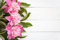 Bunch, bouquet of pink peonies on a wooden background. Frame of flowers Royalty Free Stock Photo