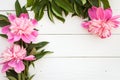 Bunch, bouquet of pink peonies on a wooden background. Frame of flowers Royalty Free Stock Photo