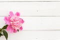 Bunch, bouquet of pink peonies on a wooden background. Frame of flowers Royalty Free Stock Photo