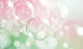 A bunch of bubbles in a green and pink background Royalty Free Stock Photo