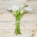 Bunch of Cala Lilies Flower summer Bouquet over Wooden Background Square Image Royalty Free Stock Photo