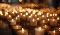 A bunch of candles are lit and arranged in a circle Royalty Free Stock Photo