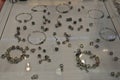 Bunch of cheap jewelry displayed on table