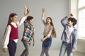 Bunch of cheerful kids dancing, laughing, having fun and enjoying their free time Royalty Free Stock Photo