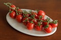 Bunch of cherry tomatoes on a ceramic bowl Royalty Free Stock Photo